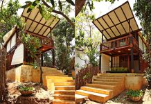 บ้านไม้สองชั้นตั้งอยู่บนเนิน ชั้นล่างโปร่งโล่ง ด้านบนมีระเบียงไม้ชมวิว